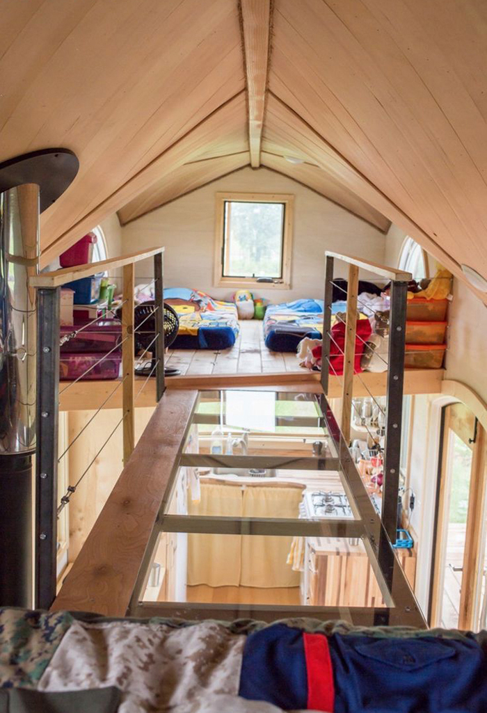 Beds on the second floor of tiny house on wheels