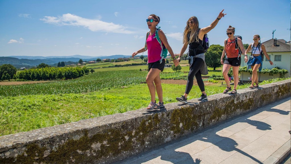 Pilgrims having fun while walking the Way