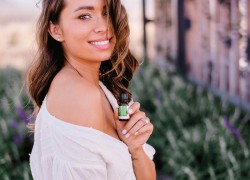 Girll with essential oil in her hand