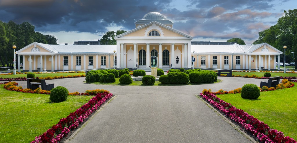 Stormy clouds over Hedon Spa Hotel - the mud baths in Pärnu and flowers in front of the building