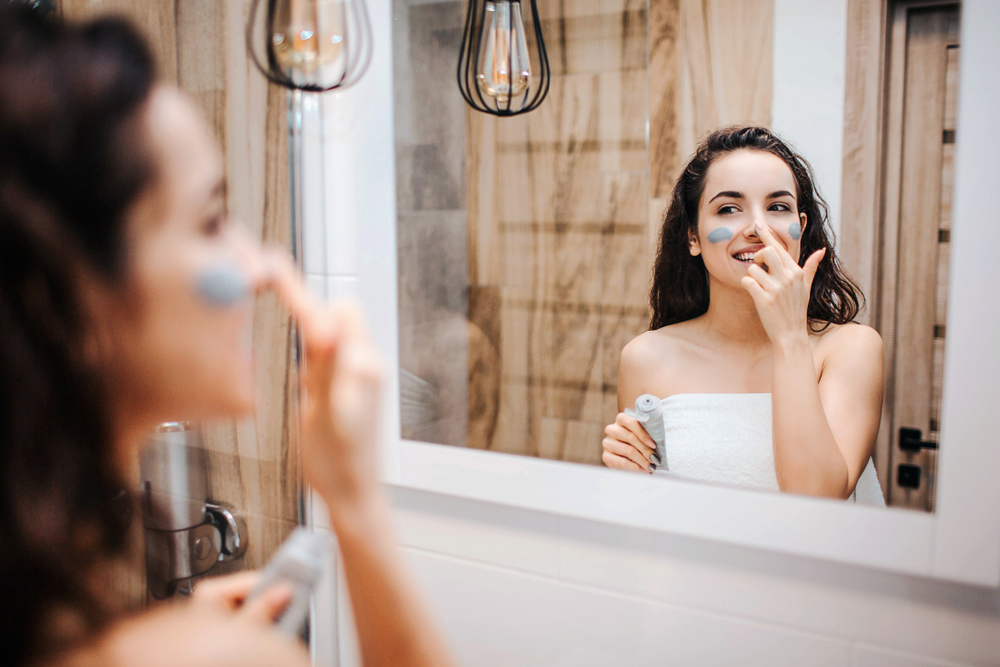 Woman doing her morning beauty routine