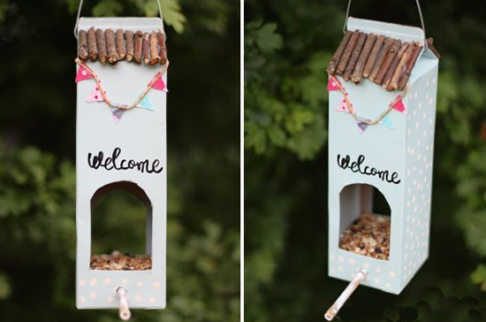 Recycled milk plastic bottle bird house saying welcome