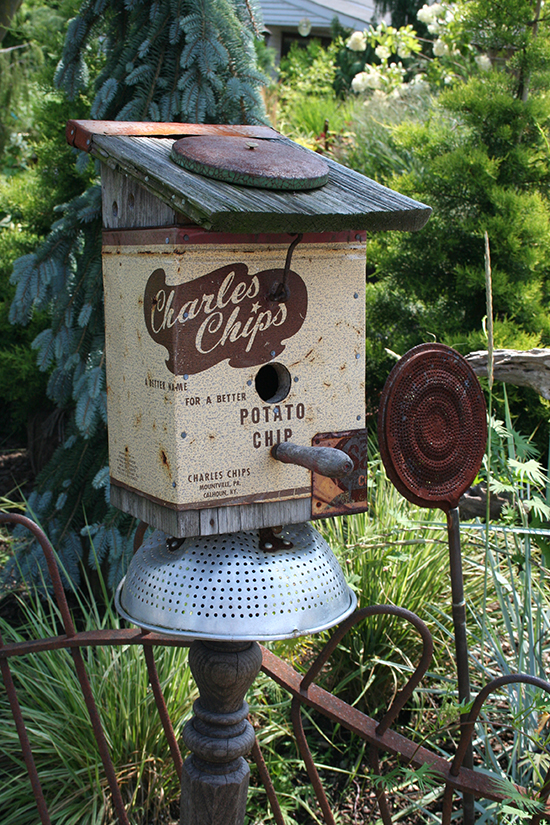 Potato chip box converted into a birdhouse