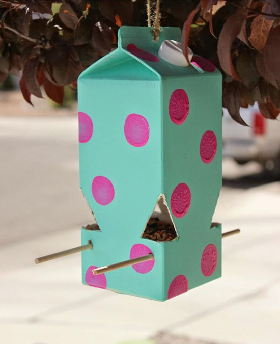 Recycled plastic bottle bird house with nice decor of big dots