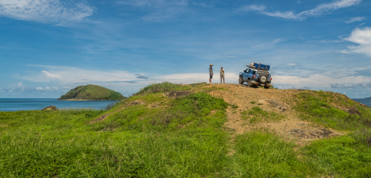 Two persons exploring Cape York Peninsula with their sport car