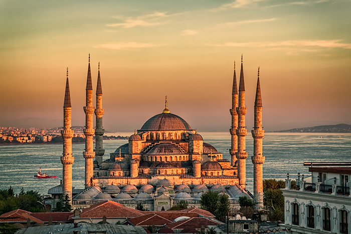 Sunset in Istanbul with a view of a mosque and the Bosphorus