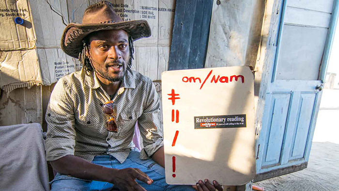 Man showing click language in Namibia
