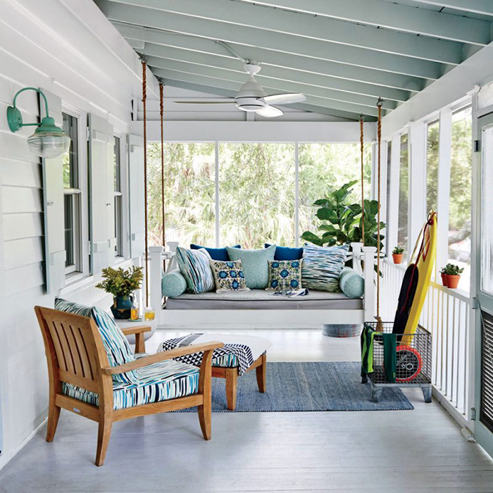 Modern Wooden Porch Swing in a nicely decorated balcony