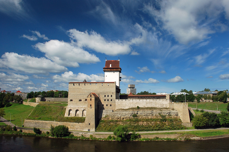 Beautiful Narva castle with green surroundings and a river