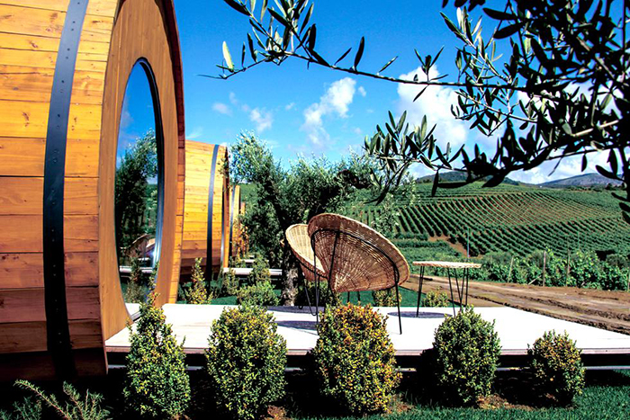 Wooden chairs at the entrance of a wine resort with view on The Douro Valley