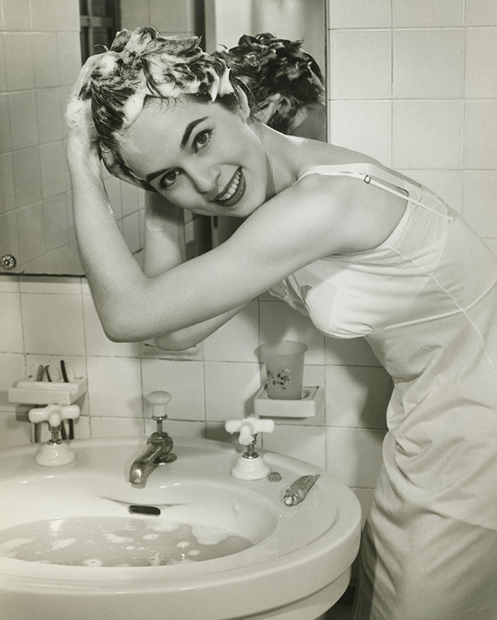 Retro hair washing woman