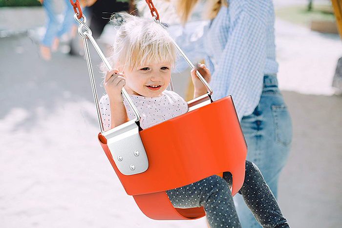 Toddler on a bucket swing