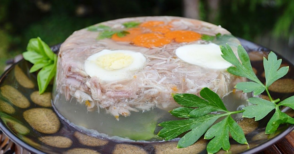 Aspic with pork meat, jelly, vegetables and boiled eggs