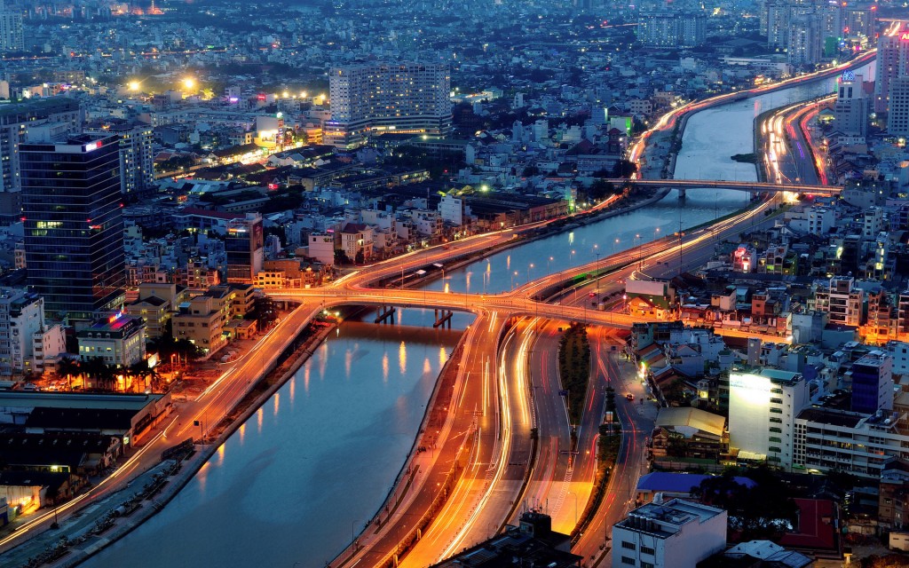 Ho Chi Min City during night and the river going through it