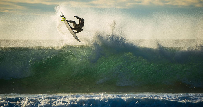 Surfing on big waves in Africa