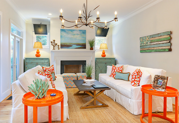 Living room with big chandelier and coastal decor