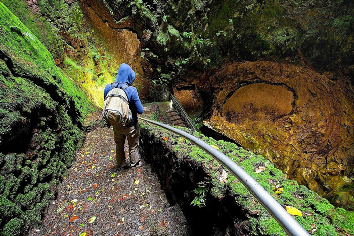 Man with a backpack exploring the Azores