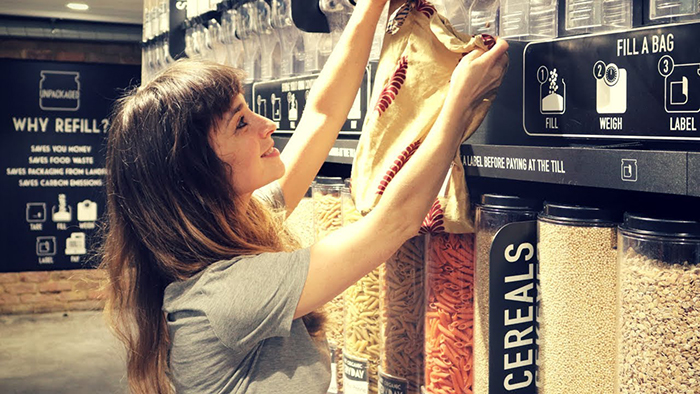 Woman doing the groceries with an eco bag