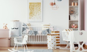 Cozy nursery room in pastel colors with white furniture