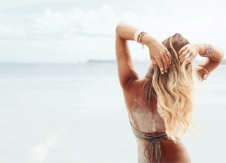 Woman on the beach with long blonde hair