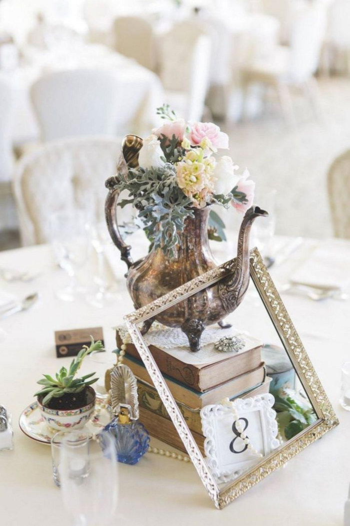 Vintage tea pot put on vintage books