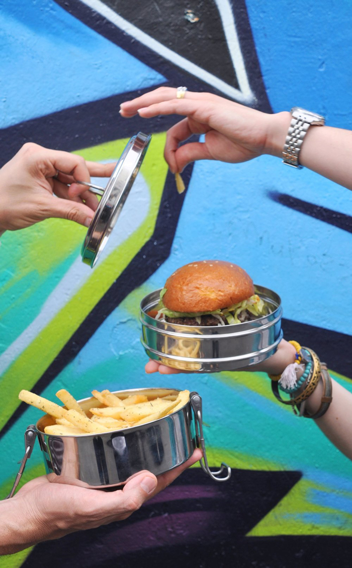 Zero waste food boxes with french fries and a sandwich