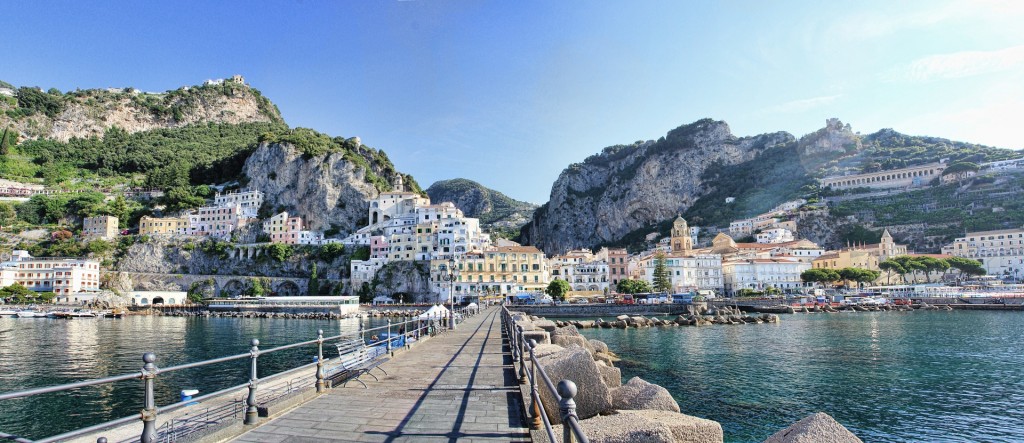 The sea surrounded with houses and high rocks