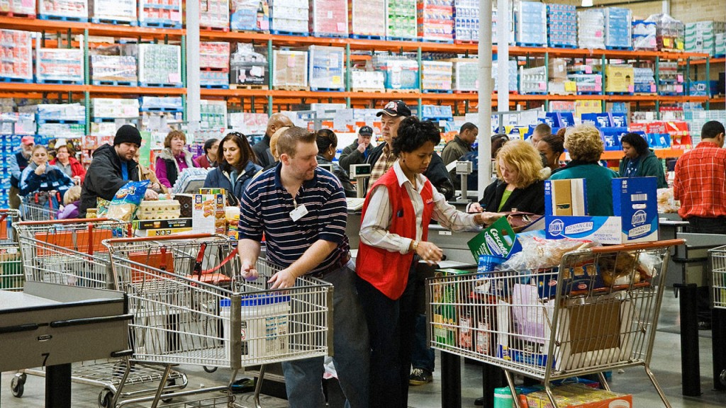 People at the supermarket buying in bulk