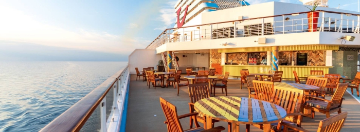 Cruise restaurant with wooden tables and chairs