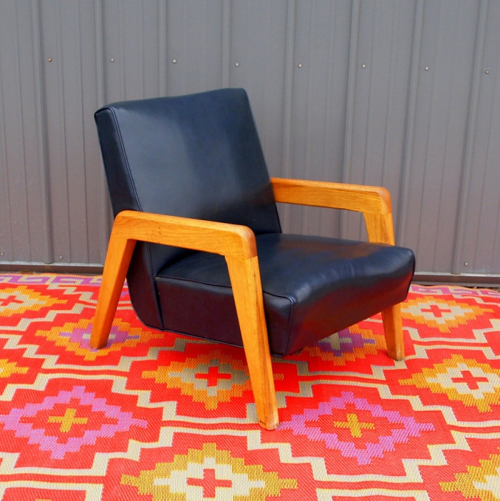 Leather reading chair on a carpet