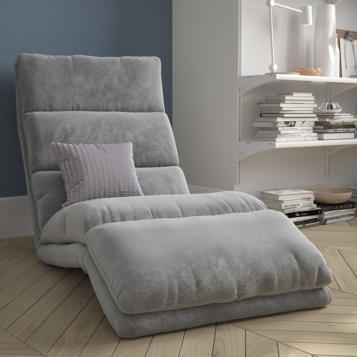 Short legs fabric reading chair with a bookshelf next to eat