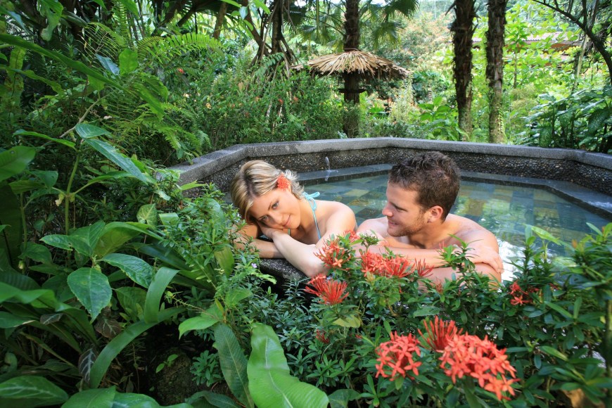 Couple sitting in the hot springs 