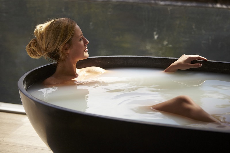 Woman in a bath tube