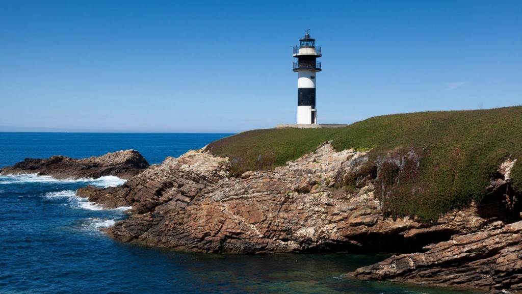 Light house next to the ocean