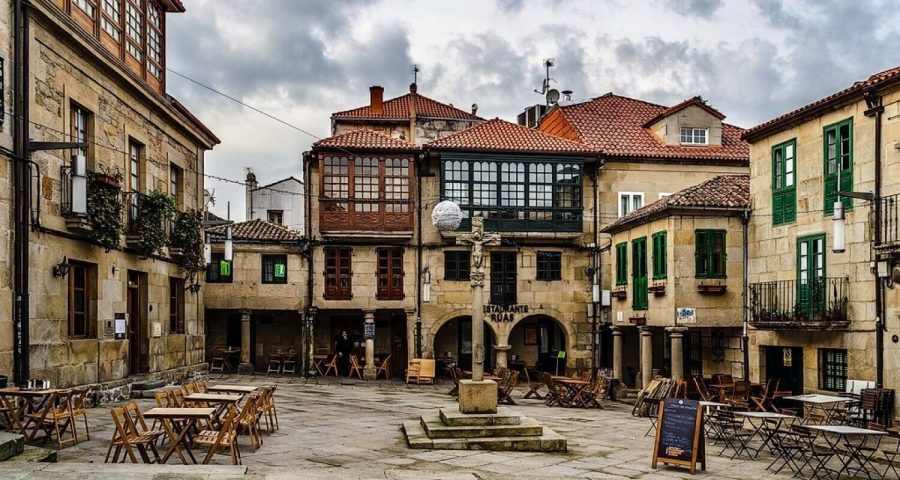 Square in Pontevedra with cute old buildings and bars in front of them