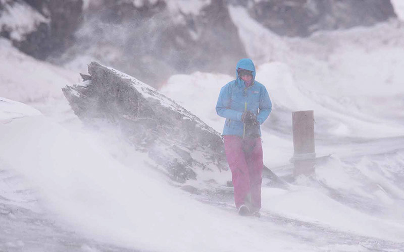 Person walking through the heavy snow in Iceland