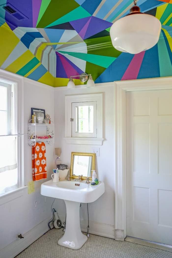 artistic colorful bathroom with painted ceiling