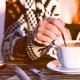 woman hand stirring coffee