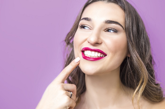 woman showing her smile