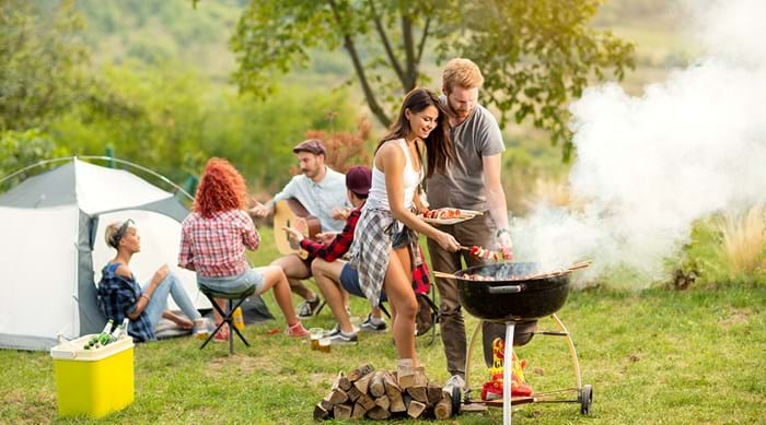 friends cooking barbecue