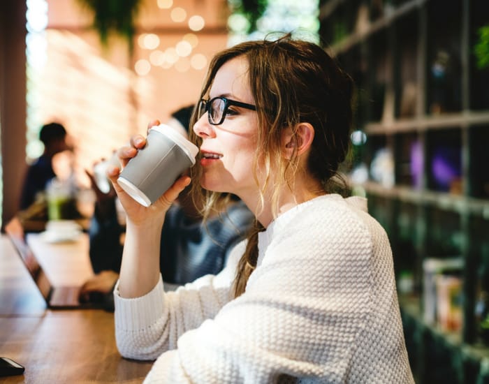 woman drinking coffee