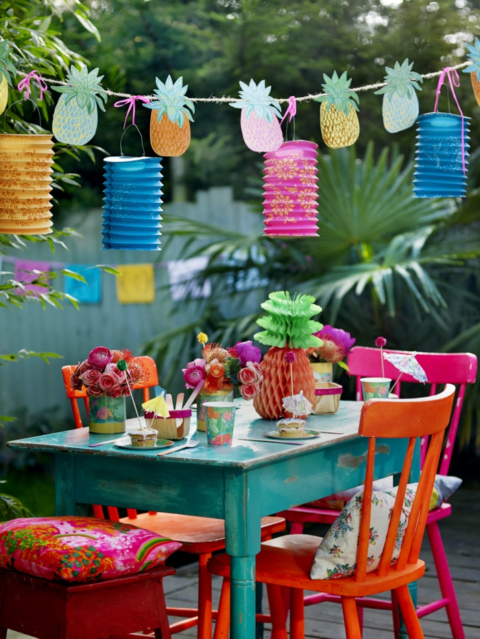 outdoor table with tropical themed decor