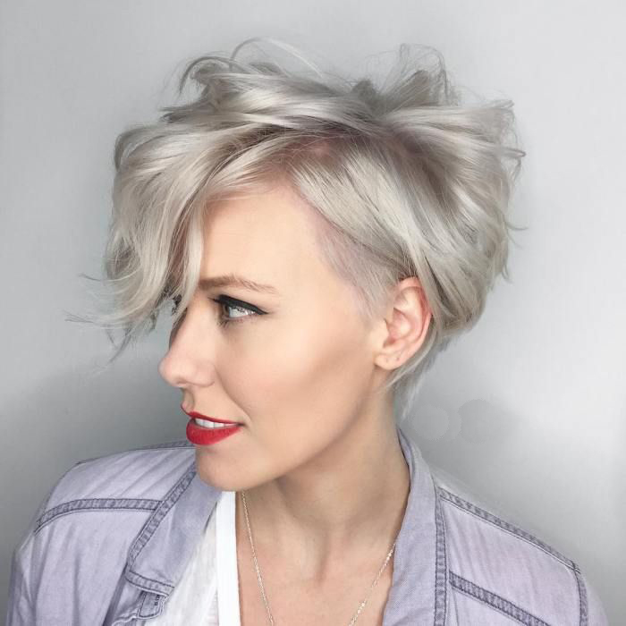 Woman with curl pixie white hair and red lipstick close up