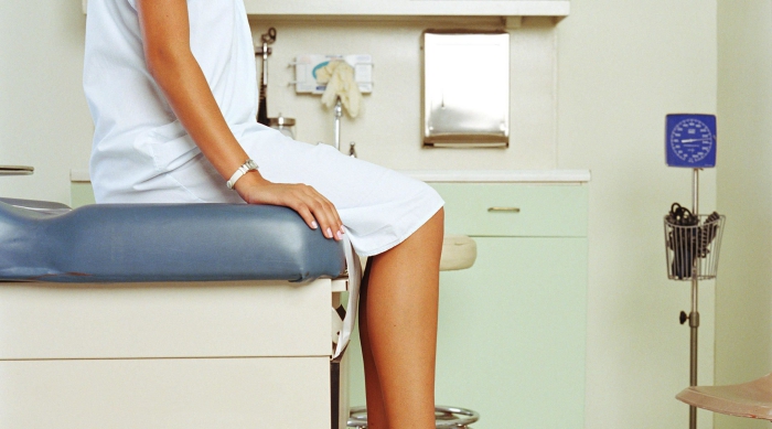 fergs fungal system woman sitting on a bench at the doctor's office 