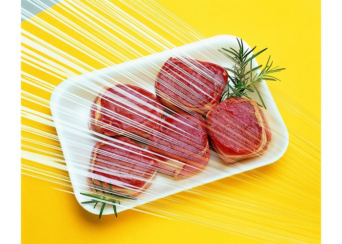 steaks wrapped in plastic foil