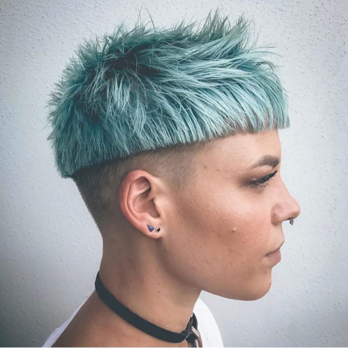 woman profile shart cut short light blue pixie