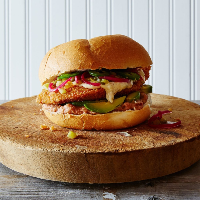 Close up Mexican torta sandwich on wooden board