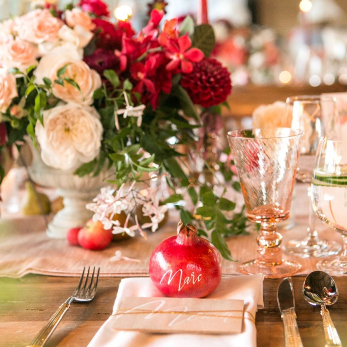 Pomegranates table signs with names for wedding beautiful wedding table colorful flowers