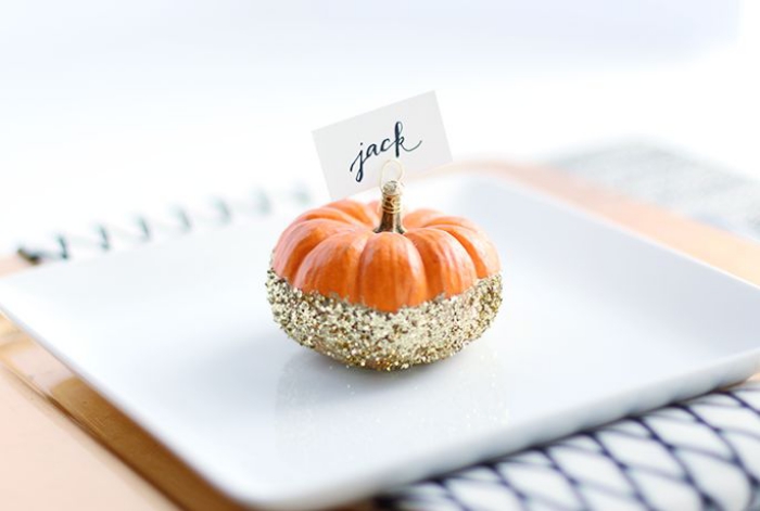 pumpkin place sign on a white plate gold glitter