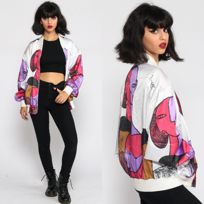 retro model with colorful bomber jacket black jeans black crop top